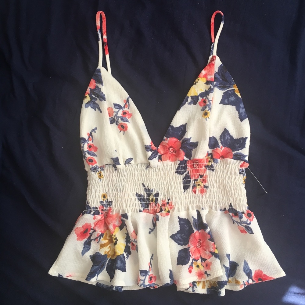 Flowery white top. Never used.